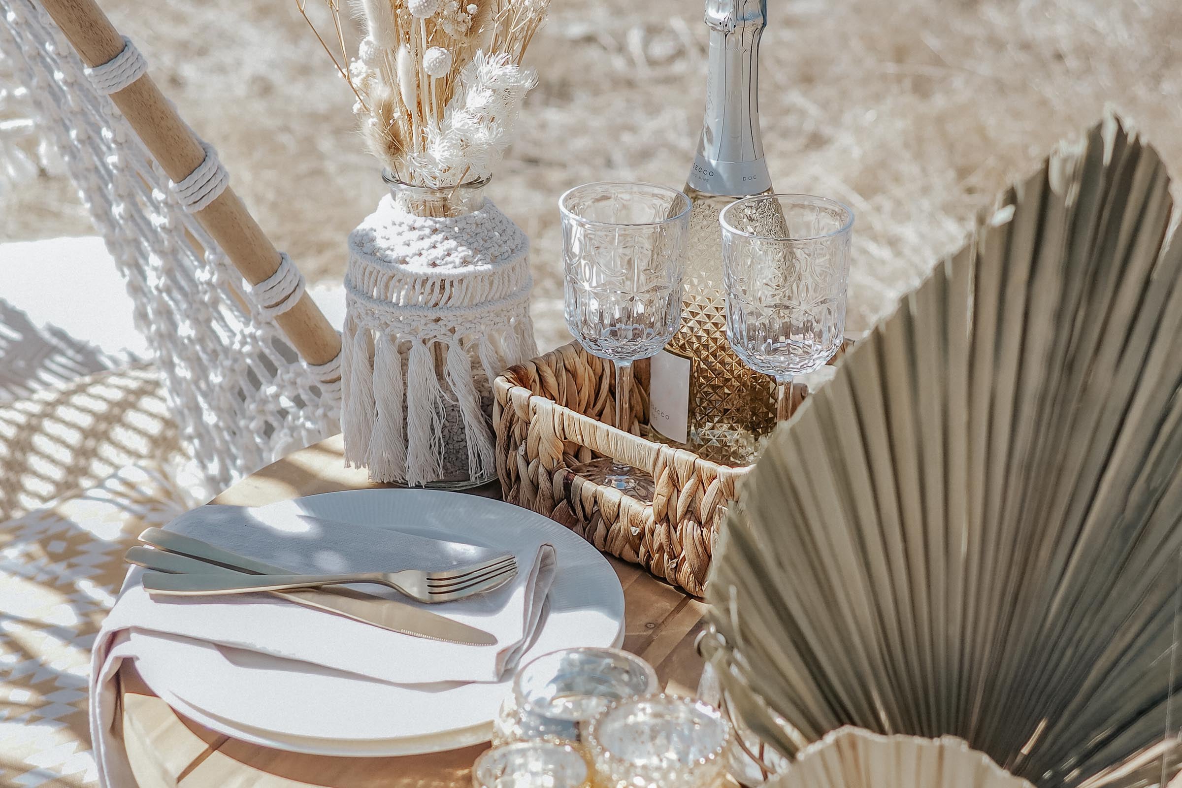 Romantic natural boho proposal in the middle of nowhere - close up of table details