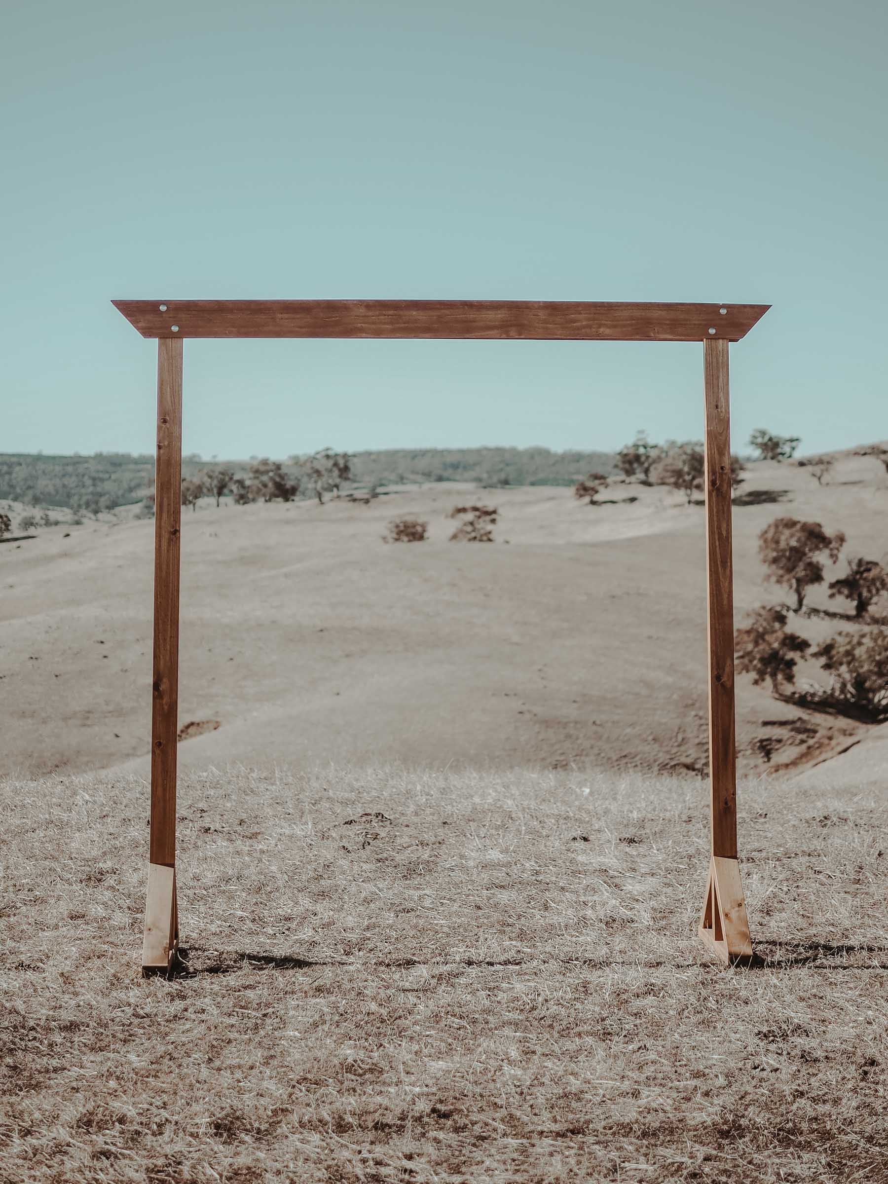 Rustic wooden arbour for backdrop