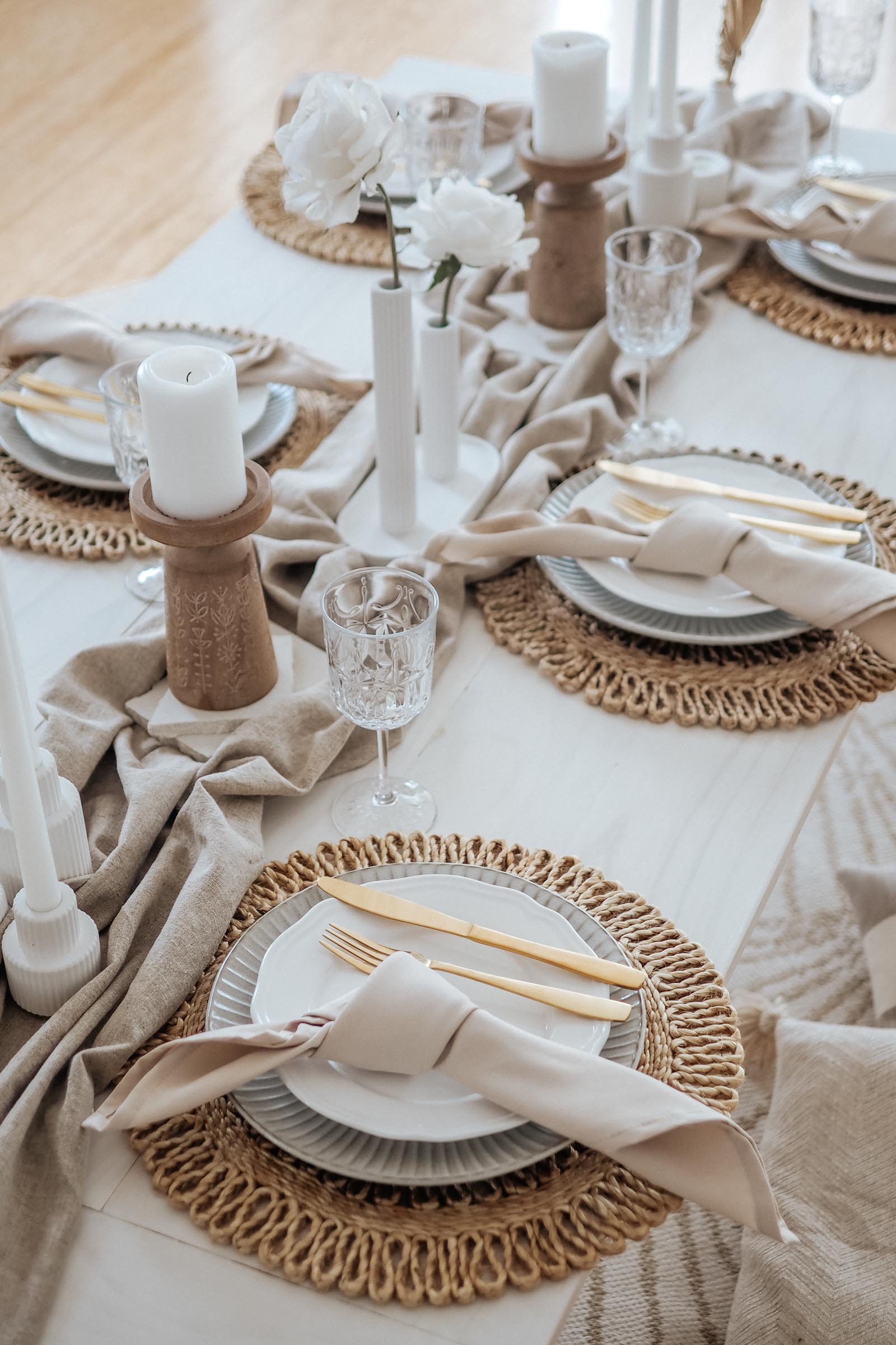 Taupe picnic - close up of table settings with concrete vases and candle holders