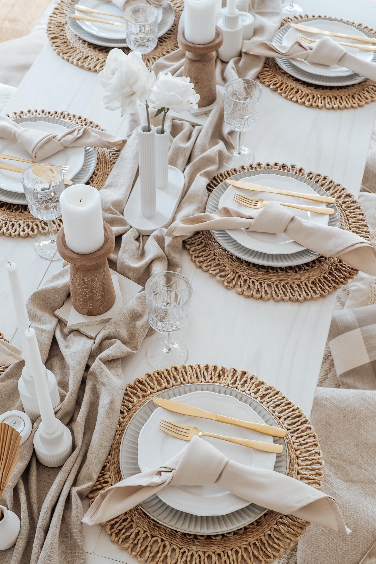 Taupe picnic - close up of table settings with jute placemats and natural candle holders
