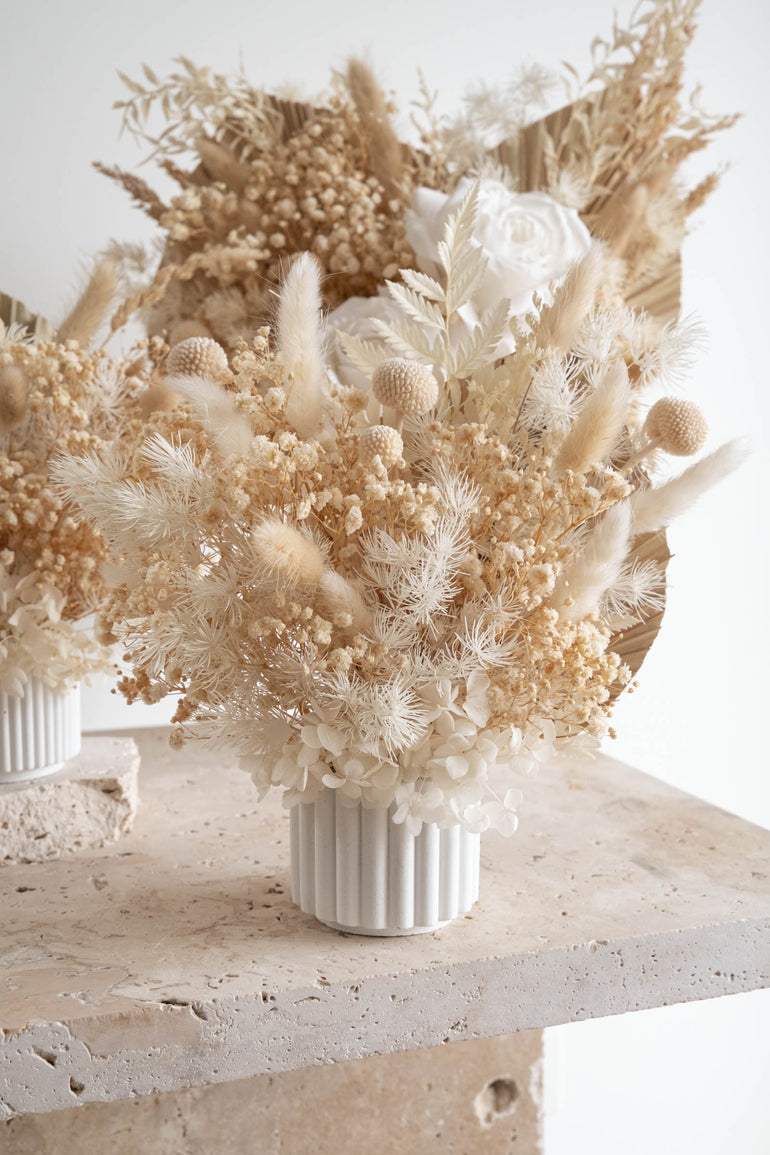 Florence scalloped vase with a natural dried floral arrangement