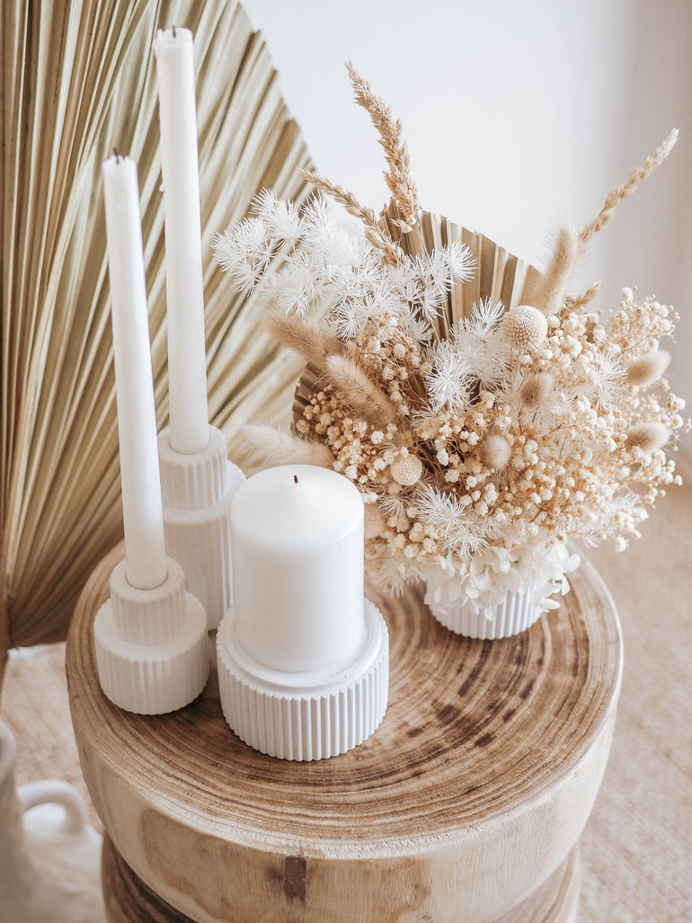 Mason candle holder displayed with our Palmer candle holders and Hunter pot in front of an extra large dried palm