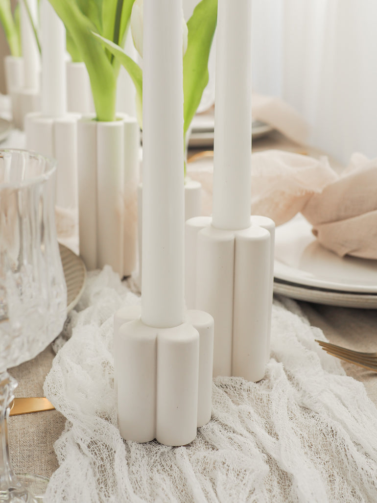 Close up of Willow candle holders on a romantic taupe tablescape
