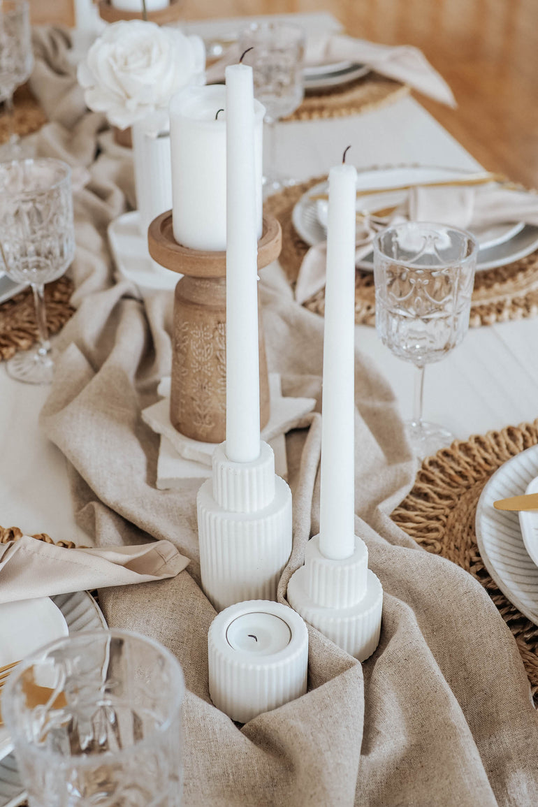 Palmer candle holder trio on a taupe linen table runner