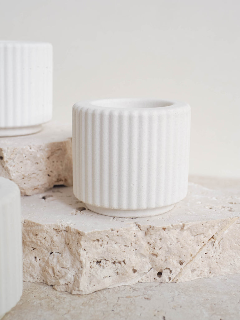 Palmer tealight candle holder in off white concrete